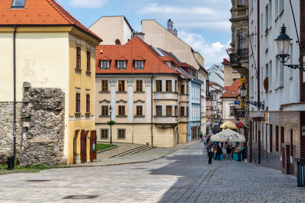 June 21, 2023: Bratislava, Slovaka - A street scene in the old town. The photo contains some people, local businesses, and both local and tourist activity in the streets.