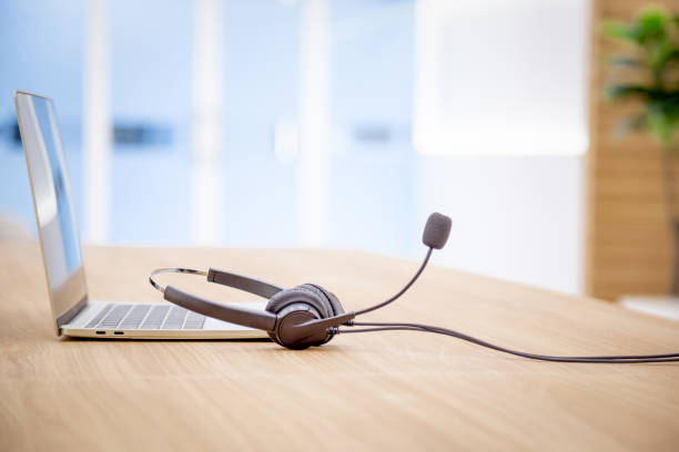 istock Headset and customer support equipment at call center service. 1500226642