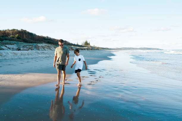 istock Father and son enjoying time together on a beach in Australia. 1500226864