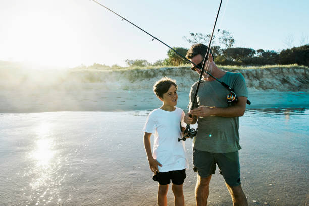 istock Getting the bait on the hook is half the job. 1500226878
