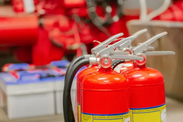 Inspection Fire extinguisher and fire hose,Ready to use in the event of a fire.Safety first concept.