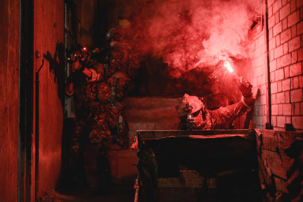 istock Expert team of soldiers attacking enemy during military operation 1500227778