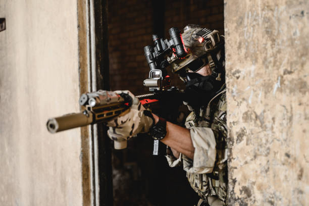 istock Army soldier in protective combat uniform, Soldier with rifle 1500227844