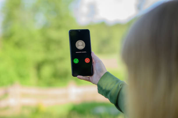 istock An incoming call from an unknown number visible on the mobile phone display 1500228653