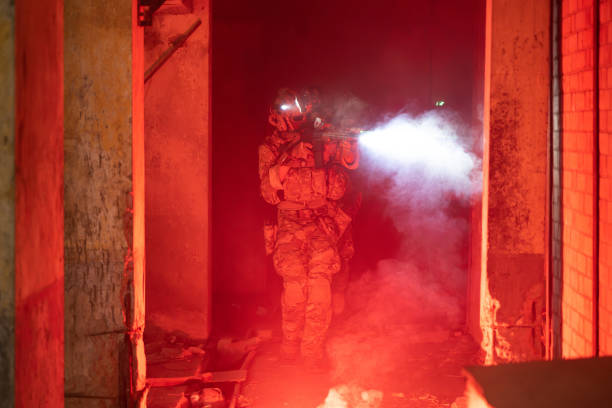 istock Expert team of soldiers attacking enemy during military operation 1500229323