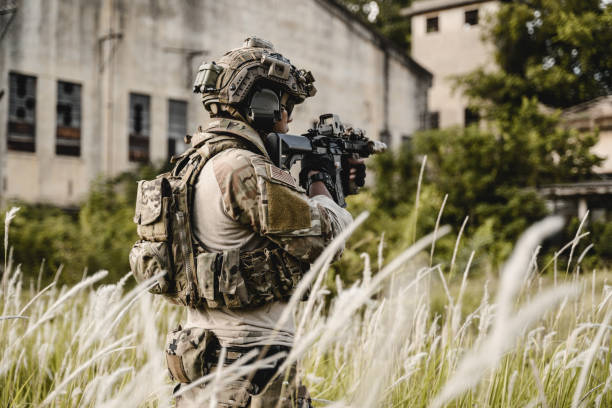 istock Smart teamwork of soldiers running forward and attacking enemy 1500230681