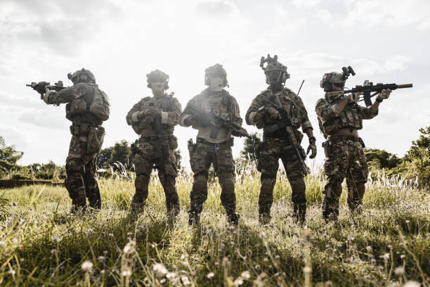 istock Smart teamwork of soldiers running forward and attacking enemy 1500230903