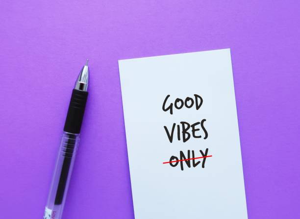 istock Note on purple background with handwritten text GOOD VIBES ONLY, crossed off ONLY avoid toxic positivity, belief that no matter how difficult situation is, people should maintain only positive mindset 1500231128