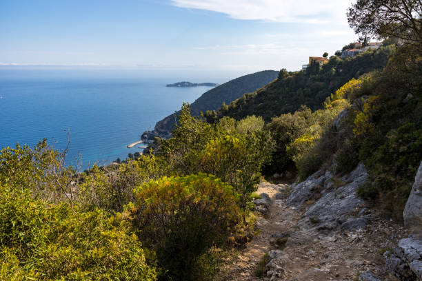 istock Path descending towards Eze-Bord-de-Mer with a view of the Mediterranean 1500231711