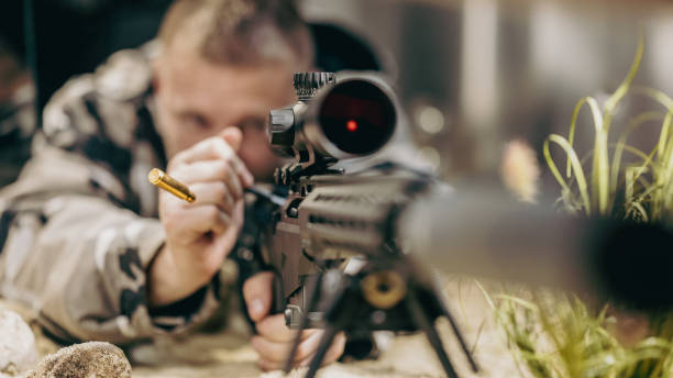 istock Soldier shooting rifle 1500235081