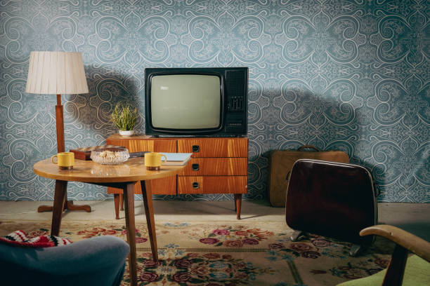 Old television in hall Old television in desk in empty hall. suitcase luggage old fashioned obsolete stock pictures, royalty-free photos & images