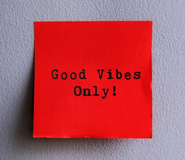 istock Stick note on wall background with handwritten text GOOD VIBES ONLY, crossed off to just GOOD VIBES, concept of avoid toxic positivity - belief that no matter how difficult situation is, people should maintain only positive minds 1500237230