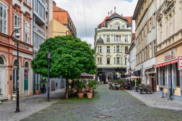 June 21, 2023: Bratislava, Slovaka - A street scene in the old town. The photo contains some people, local businesses, and both local and tourist activity in the streets.