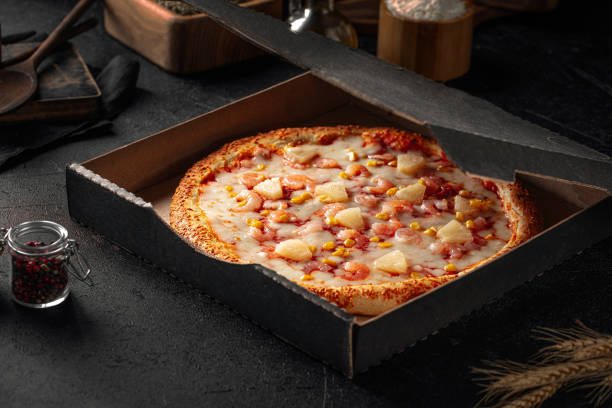 istock Take away hawaii pineapple pizza with cheese 1500237436