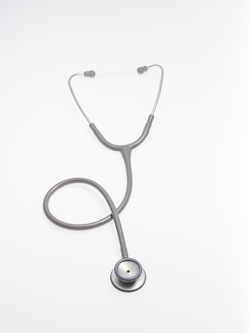 A medical stethoscope isolated on a white background.