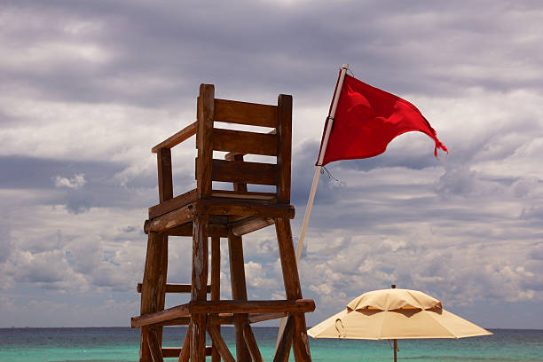 istock Empty Lifeguard Chair and Umbrella at Beach 150024226