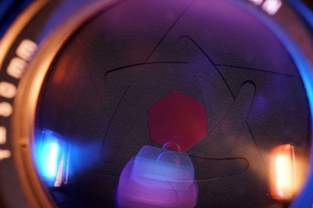 istock Camera lens with light and lens flare, close-up 1500242689