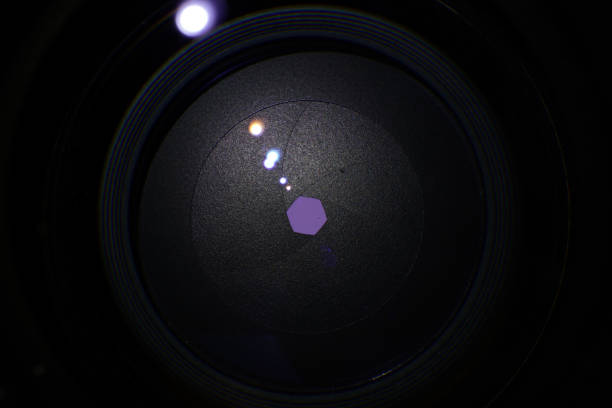istock Camera lens with light and lens flare, close-up 1500244366