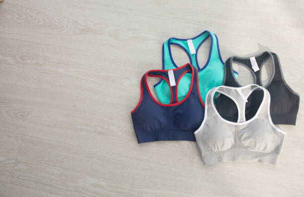 istock Colourful women's sports bra on grey background 1500247828