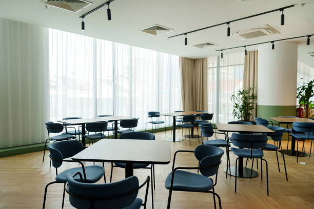 istock Modern office cafeteria interior with a comfortable chairs and tables 1500248851