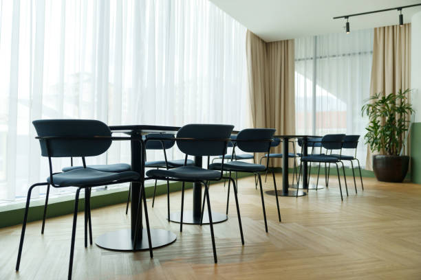 istock Modern office cafeteria interior with a comfortable chairs and tables 1500249287