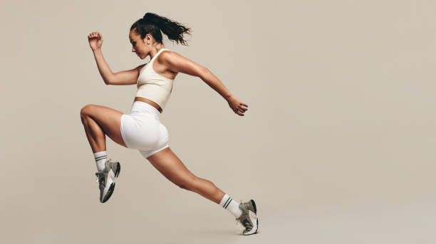 istock Sportswoman running and doing strength training in a studio 1500254143