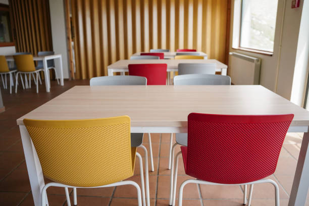 istock a classroom in a rural school with empty tables and chairs in the mountains. Back to school 1500256043