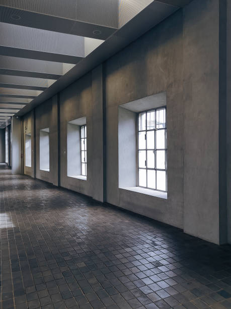 istock Corridor illuminated by bright windows. Modern space in old factory 1500258842