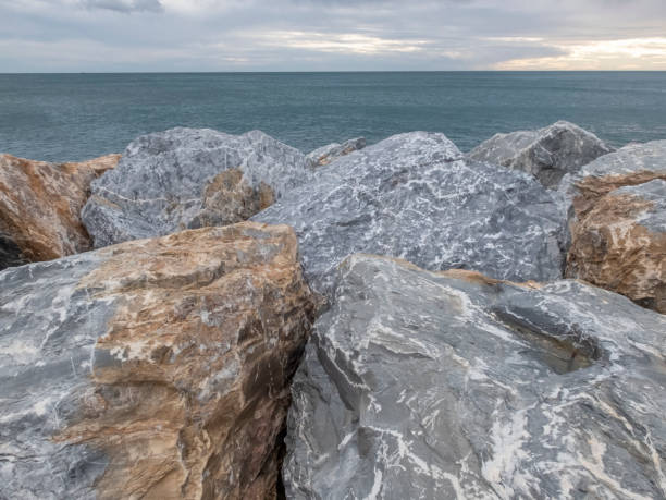 istock Sunrise and horizon with stones in foreground 1500258863