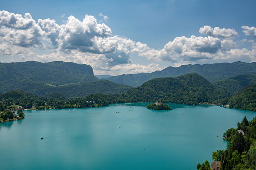 Lake Bled with the Bled island (Blejski otok), in Gorenjska (Upper Carniolan region), Slovenia, during a beautiful springtime day. High angle drone point of view.