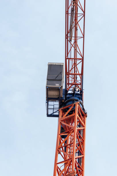 istock construction crane,Construction crane against the sky. On construction site,Crane 1500264010