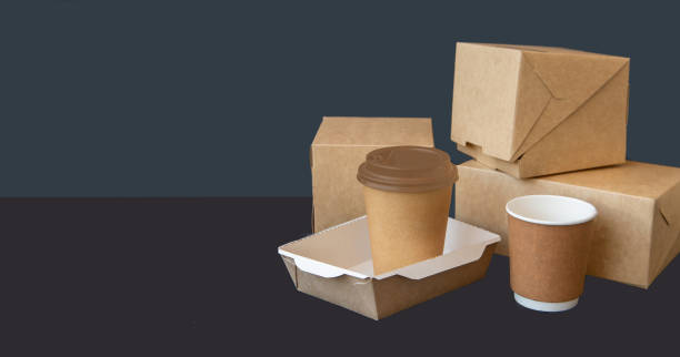 istock Eco-friendly cardboard packaging. Biodegradable boxes and cups. Concept of refusal from plastic. Caring for the environment. 1500281537