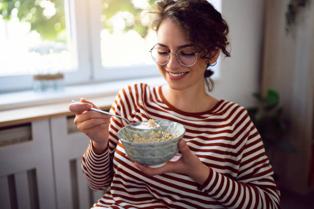 istock Young Caucasian woman having an oatmeal breakfast 1500286201