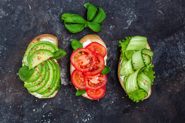 Sandwiches with tomato, avocado and cucumber