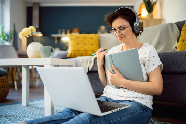 istock Young woman, a university student, studying online. 1500288728