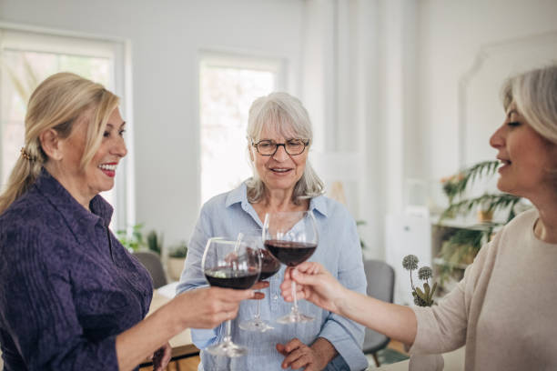 istock Female friends enjoying wine 1500289107