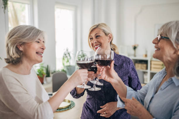 istock Female friends enjoying wine 1500289151
