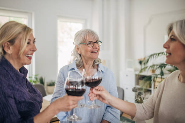 istock Female friends enjoying wine 1500289216