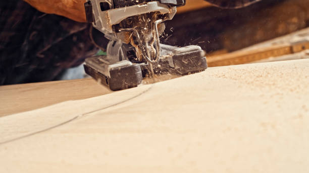 istock Saw cutting wooden plank 1500290839