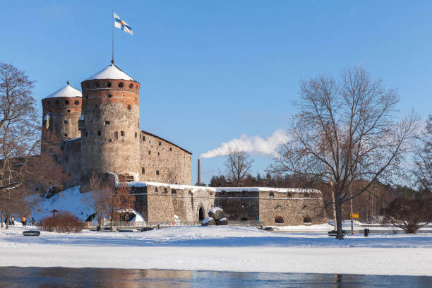 Savonlinna, Finland - February 24, 2018: Winter landscape with Olavinlinna, this is a 15th-century three-tower fortress