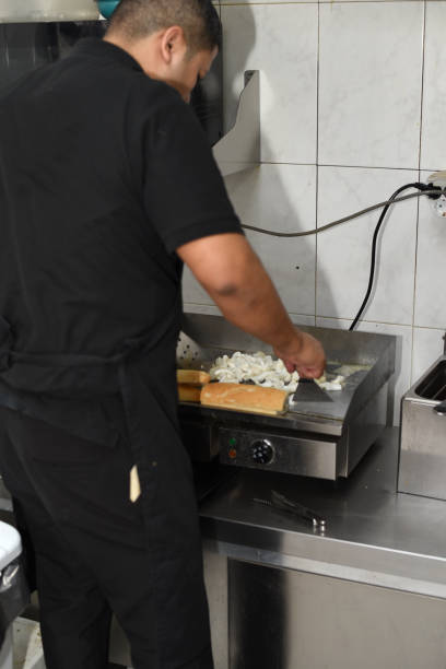 istock the chef prepares a cuttlefish sandwich 1500303252