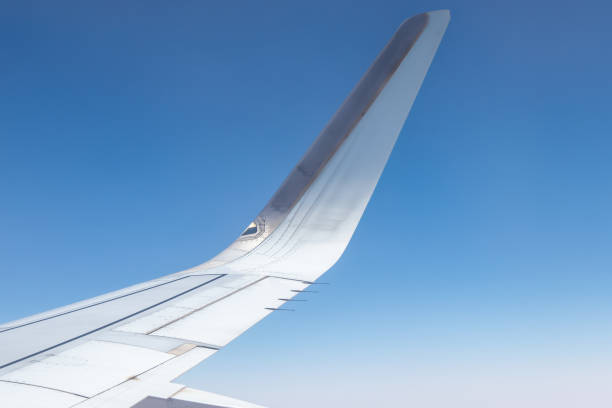 See the top of the plane's wing through the plane window