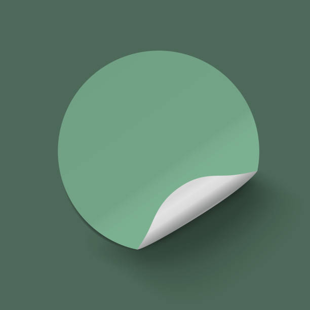 istock Vector green realistic round paper adhesive stickers with curved corner on green background. 1500304814