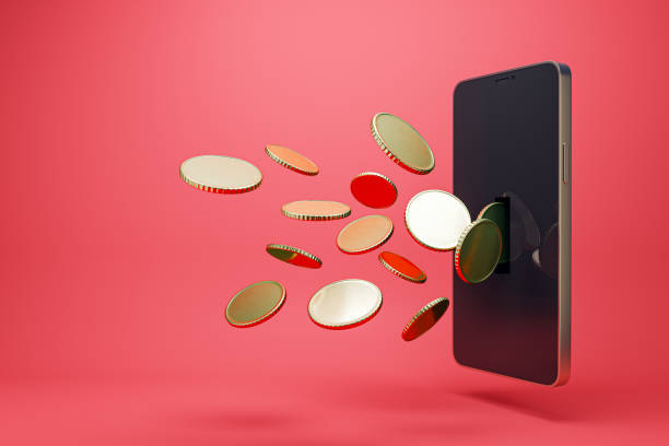 istock Financial mobile application, cashback and earning concept with golden coins returning back from dark modern smartphone on red background. 3D rendering 1500307997