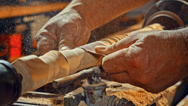 istock Carpenter's hands polishing wood 1500308087