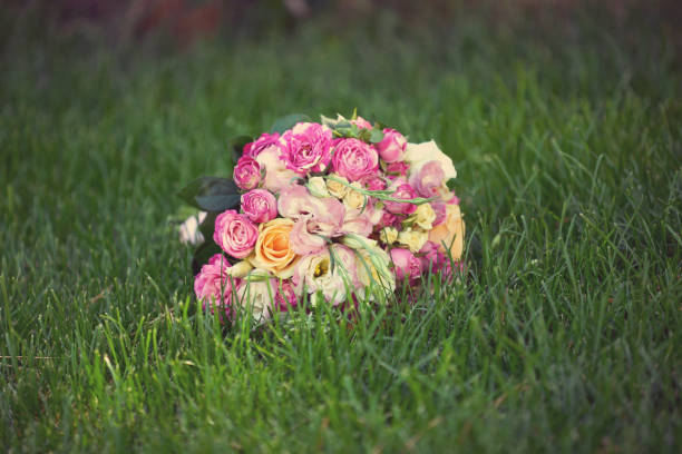 Wedding bouquet on lush green grass