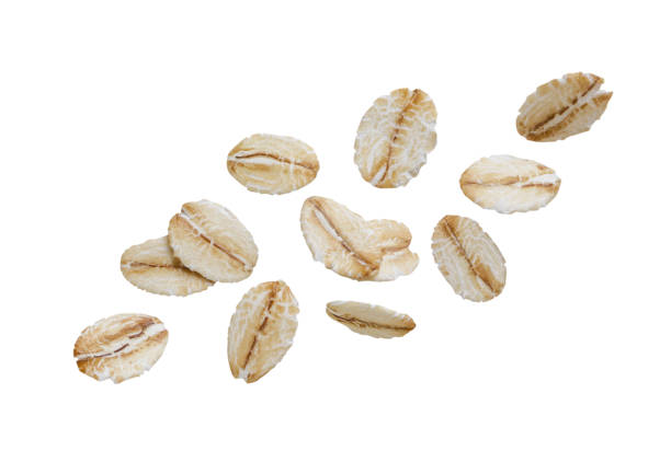 istock Oat flakes fly close-up on a white background. 1500312386