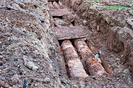 Old water pipes in the ground.