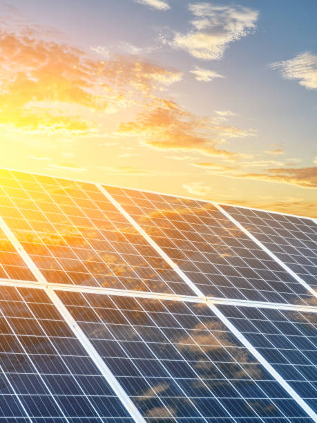 istock Solar panels and sky clouds at sunrise 1500321236