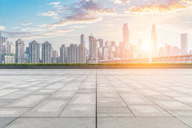 istock Empty square pavement and city buildings skyline 1500321530